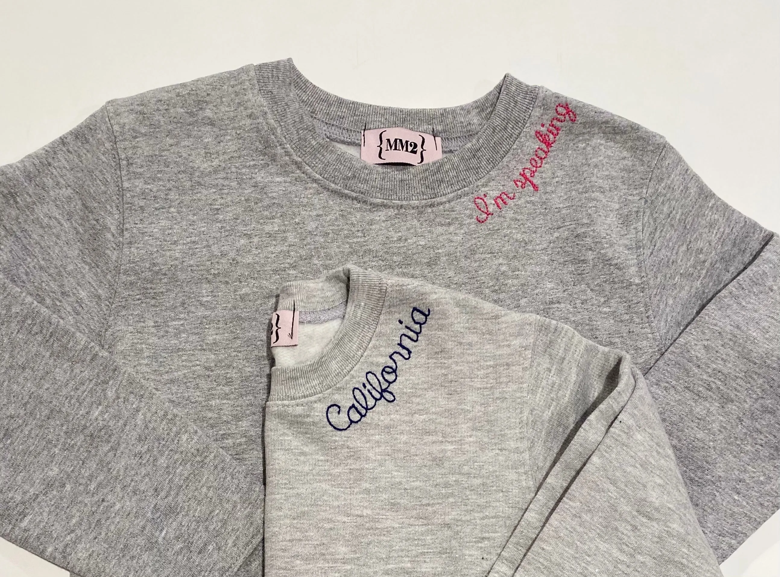 Our favorite UNISEX sweatshirts custom embroidered with school, sorority, club, city, state or anything you want!