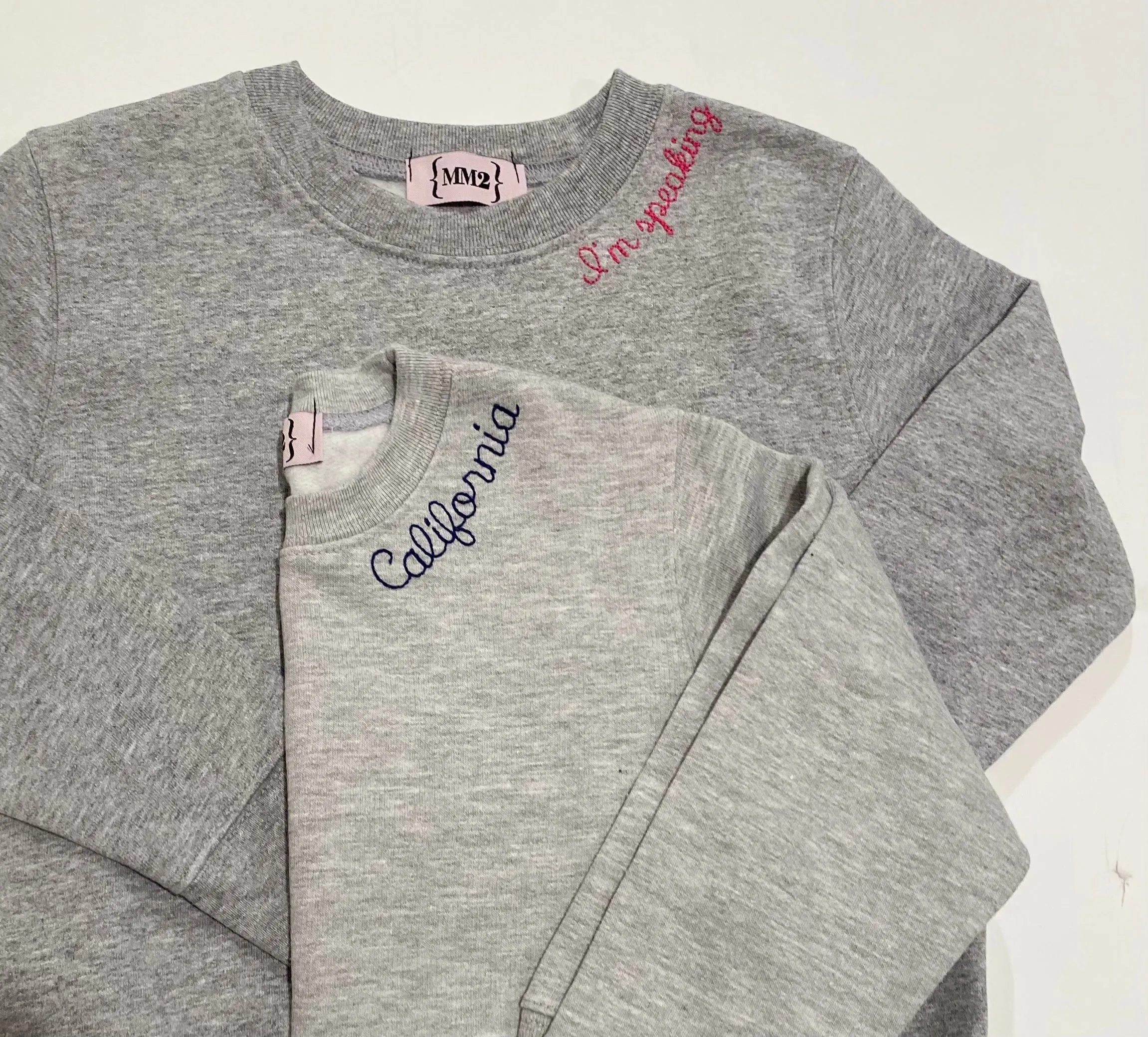 Our favorite UNISEX sweatshirts custom embroidered with school, sorority, club, city, state or anything you want!